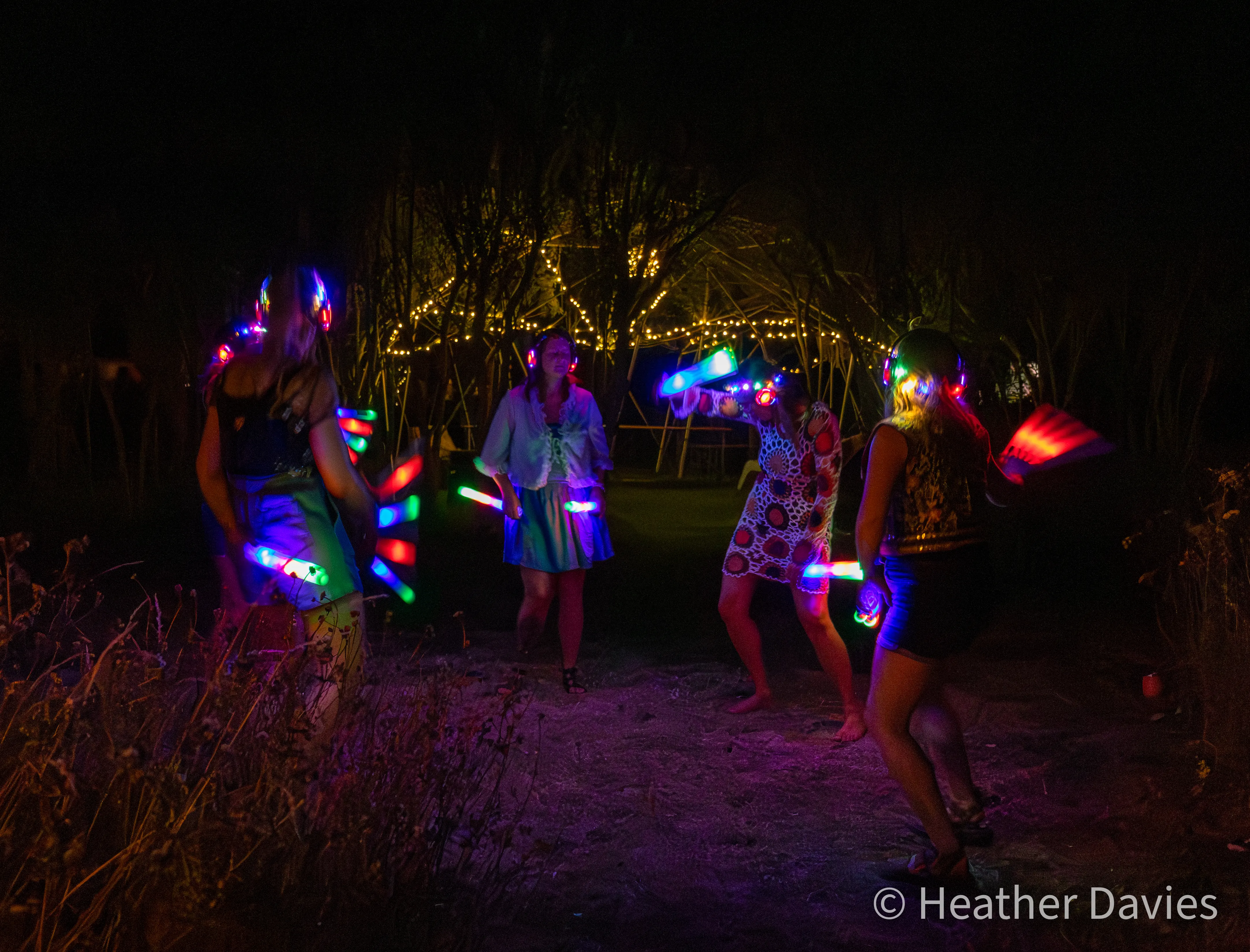 Guests dancing with colourful lights at Bec's 40th birthday party